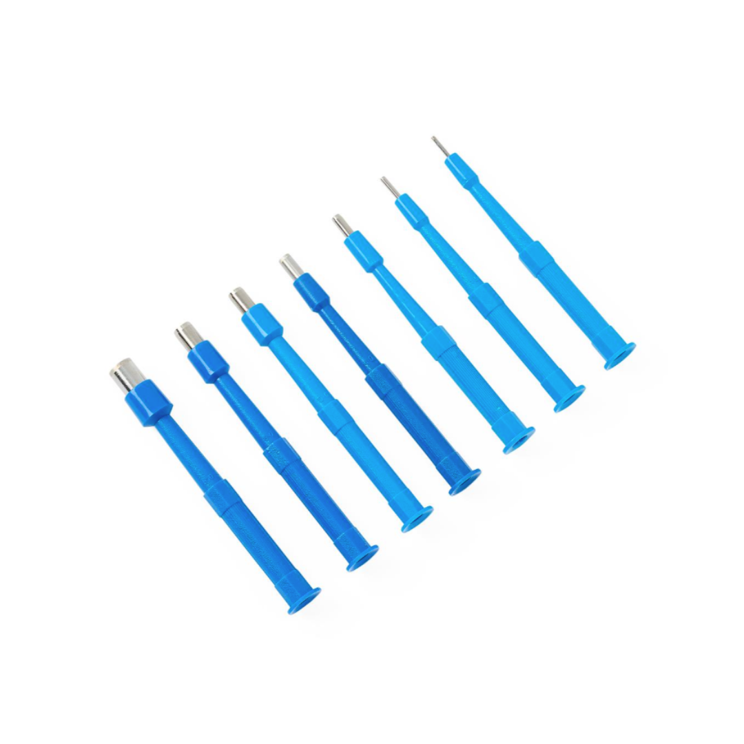 Seven Medline Sterile Biopsy Punches, each in a different size and blue color, are arranged diagonally on a white background, resembling surgical instruments used for tissue sampling.